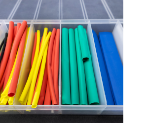 термозбіжні трубки в пластиковому контейнері